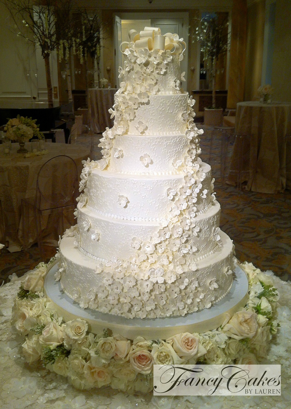 Silk flower cascade for wedding cake